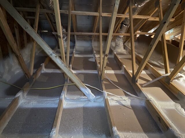 Air sealing in Baltimore home's attic.