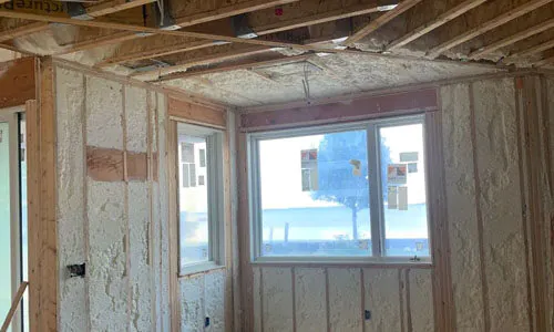 Open cell spray foam wall insulation
