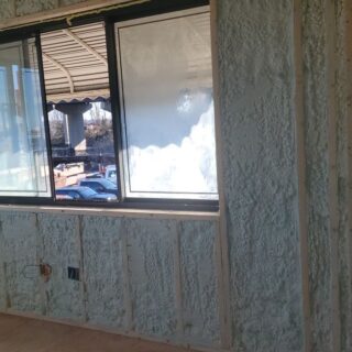 Exterior wall spray foam insulation